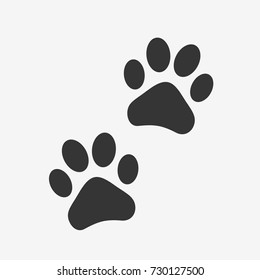 Dog or cat paw print flat icon for animal apps and websites