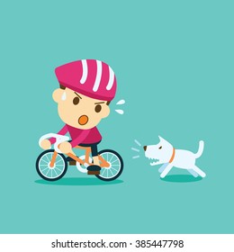 a dog chasing cyclist