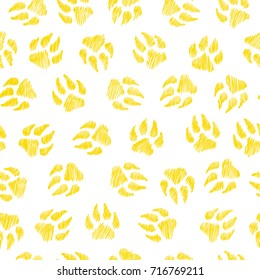Dog footprint - seamless pattern. Cute vintage print. Handmade. Yellow and white colors. Simple cartoon background. Vector illustration.