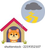 Dog in a dog house afraid of thunder