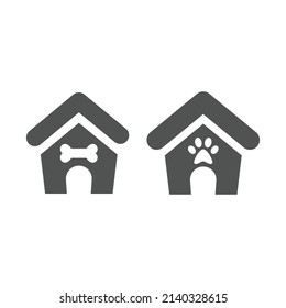 Dog house with paw and bone. Simple black filled vector icon set.
