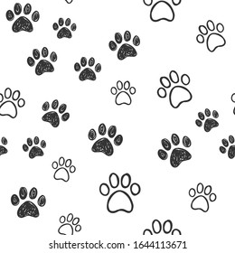 Dog paw doodles seamless pattern. Doggie love background. Puppy cute footprints.