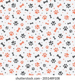 Dog paw print colorful seamless pattern. Pets cute pattern with bones.