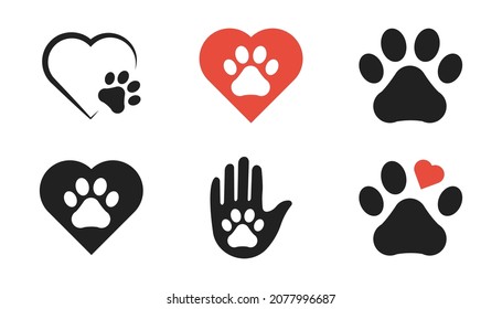 Papas de perro con corazón. Ilustración aislada del vector. Pata animal con colección de símbolos de amor. Juego de iconos de huella de gato o perro. EPS 10.