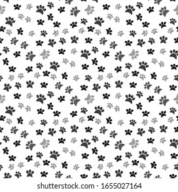 Dog paw print seamless pattern on white background