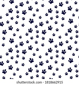 Dog paw print seamless pattern on white background .
