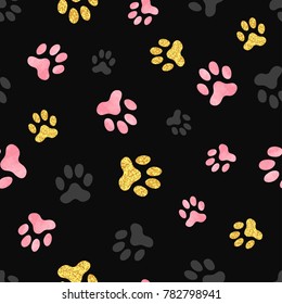 Dog paw print seamless pattern in pink, black and golden colors. Vector illustration.