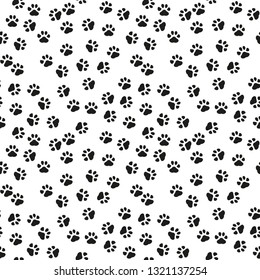 Dog paw print vector seamless pattern or background