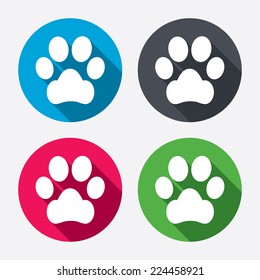 Dog paw sign icon. Pets symbol. Circle buttons with long shadow. 4 icons set. Vector