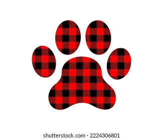 Dog paw silhouette with red and black Christmas buffalo pattern. Canine footprint with gingham checkered print. Vector flat illustration