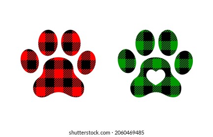 Dog paw silhouettes with Christmas buffalo patterns. Canine footprints with gingham checkered print. Vector flat illustration