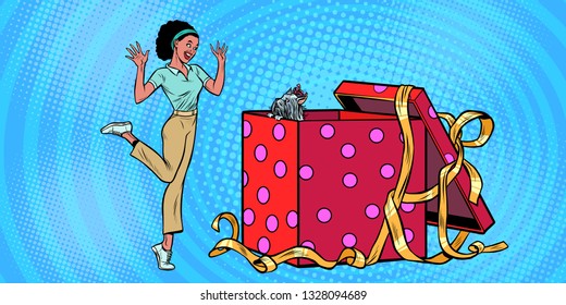 dog puppy holiday gift box. African woman funny reaction joy. Pop art retro vector illustration vintage kitsch 50s 60s