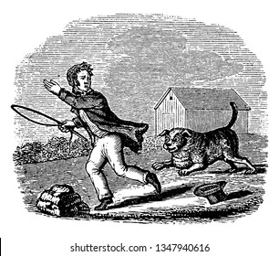 A dog running behind boy, vintage line drawing or engraving illustration