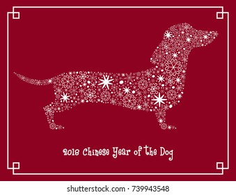 Dog silhouette with snowflakes. 2018 - Chinese Year of the Dog.  Vector illustration.