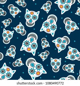 Dog skulls with flowers on blue background. For textiles, paper, holiday, day of the dead, Halloween, Wallpaper.