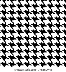 a dog tooth pattern. black and white pattern