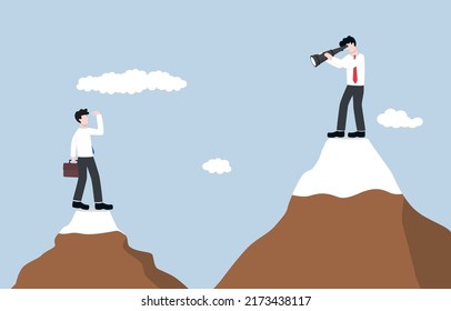 Doing business without underestimating competitor, 
strategy to sustain growth among competitive market concept, Entrepreneur businessman using telescope to look at competitor on mountain below.  - Shutterstock ID 2173438117