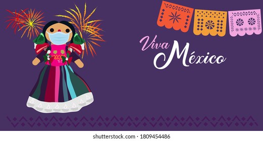 Doll with face mask celebrating Mexican Independence day celebration banner - text in Spanish: Long live Mexico 