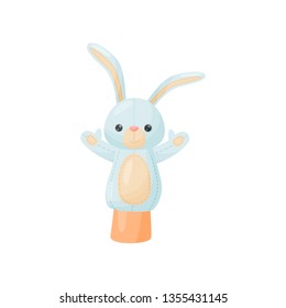 Doll hare on hand on white background.