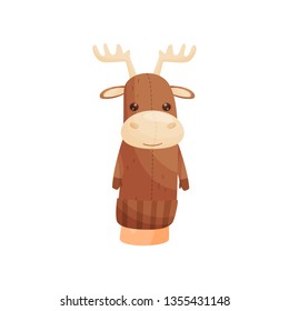 Doll moose on hand on white background.