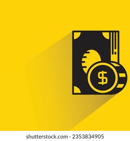 dollar banknote and coin with shadow on yellow background