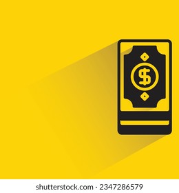 dollar banknote with shadow on yellow background