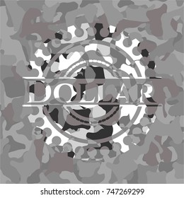 Dollar on grey camouflaged texture
