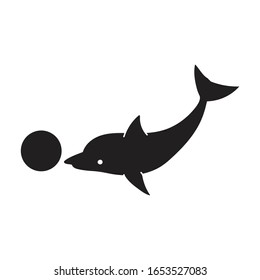 Dolphin with ball vector icon.Black vector icon isolated on white background dolphin with ball .