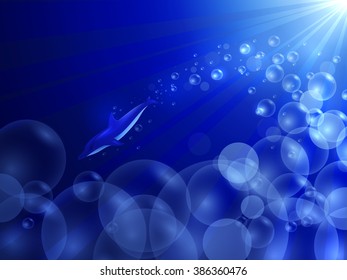 Dolphin and bubbles under water falling rays of light