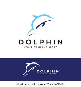 Dolphin logo. Dolphins jump on the waves of the sea or the beach.