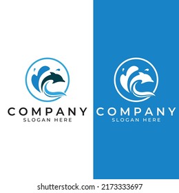 Dolphin logo. Dolphins jump on the waves of the sea or the beach.