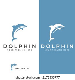 Logo del delfín. Los delfines saltan sobre las olas del mar o de la playa.