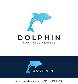 Dolphin logo. Dolphins jump on the waves of the sea or the beach.