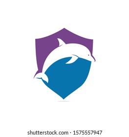Dolphin shield shape concept  vector logo design. Creative dolphin icon vector design template.