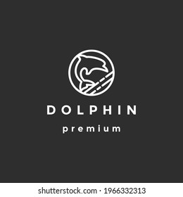 Dolphin smart fish jump logo in the sea template design on black background
