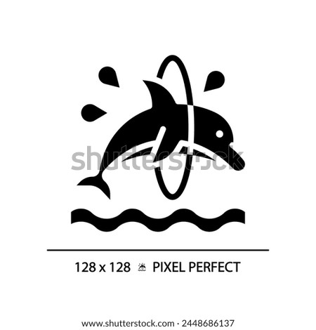 Dolphin trick pixel perfect black glyph icon. Jumping through hoop. Dolphinarium aquatic show. Acrobatic entertainment. Silhouette symbol on white space. Solid pictogram. Vector isolated illustration