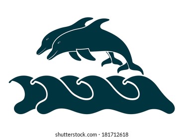 dolphins in the waves