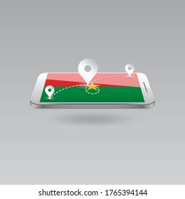 Domestic, local tourism in their own country. Icons and travel route on the national flag of BURKINA FASO in a mobile phone. Recreation, entertainments, routes in a place of residence.