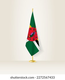 Bandera de Dominica en un puesto de bandera. Ilustración vectorial.