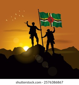 Dominica flag, silhouette of two climbers holding flags at sunset