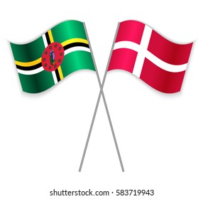 Dominican and Danish crossed flags. Dominica combined with Denmark isolated on white. Language learning, international business or travel concept.