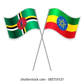 Dominican and Ethiopian crossed flags. Dominica combined with Ethiopia isolated on white. Language learning, international business or travel concept.