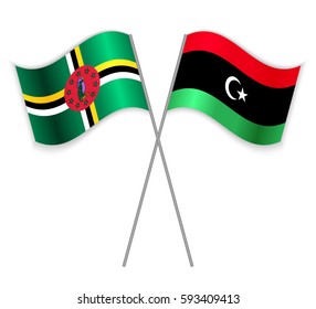 Dominican and Libyan crossed flags. Dominica combined with Libya isolated on white. Language learning, international business or travel concept.