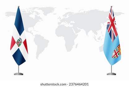 Dominican Republic and Fiji flags for official meeting against background of world map.