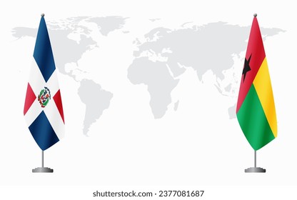 Dominican Republic and Guinea Bissau flags for official meeting against background of world map.