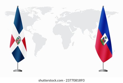 Dominican Republic and Haiti flags for official meeting against background of world map.