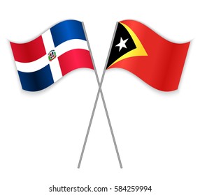 Dominican and Timorese crossed flags. Dominican Republic combined with East Timor isolated on white. Language learning, international business or travel concept.