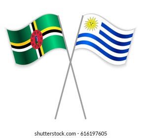 Dominican and Uruguayan crossed flags. Dominica combined with Uruguay isolated on white. Language learning, international business or travel concept.
