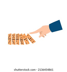 Domino effect. A hand pushes one domino with its finger and all the dominoes fall in a chain. Falling dominoes with different numbers of dots. Simbol of failure, business, market crash, crisis.