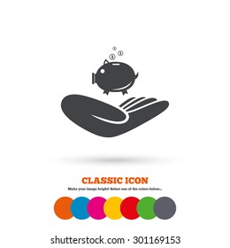 Donation hand sign icon. Hand holds Piggy bank. Charity or endowment symbol. Human helping hand palm. Classic flat icon. Colored circles. Vector